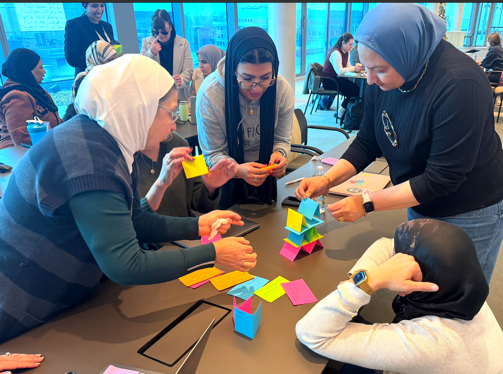Educators collaborating on a hands-on building activity